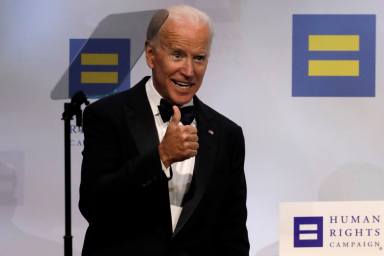 Former U.S. Vice President Biden gestures during the Human Rights Campaign dinner in Washington