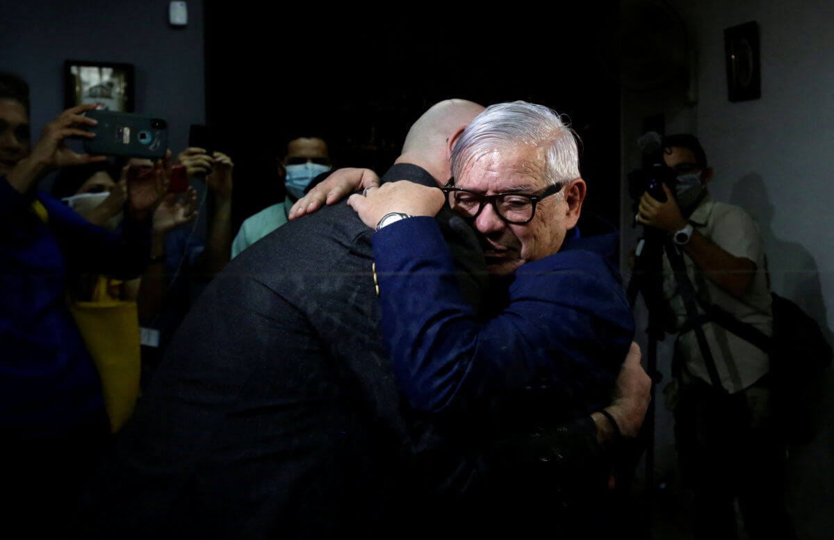 Rodrigo Campos and his partner Marcos Castillo embrace during their marriage ceremony, after Costa Rica legalised same-sex marriage, in San Jose