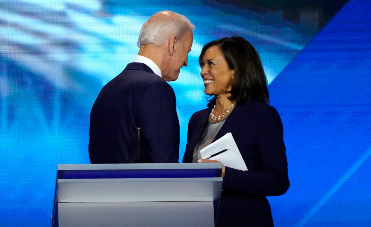 Former Vice President Biden talks with Senator Harris after the conclusion of the 2020 Democratic U.S. presidential debate in Houston, Texas, U.S.