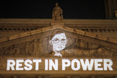 FILE PHOTO: An image of Associate Justice of the Supreme Court of the United States Ruth Bader Ginsburg is projected onto the New York State Civil Supreme Court building in Manhattan, New York City, U.S. after she passed away