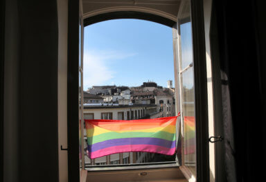 A rainbow flag is pictured on the window at Vogay in Lausanne