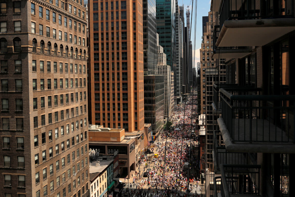 Activists march in the Alternative Queer Liberation March on 6th Avenue on 2019 World Pride NYC and Stonewall 50th LGBTQ Pride day in New York