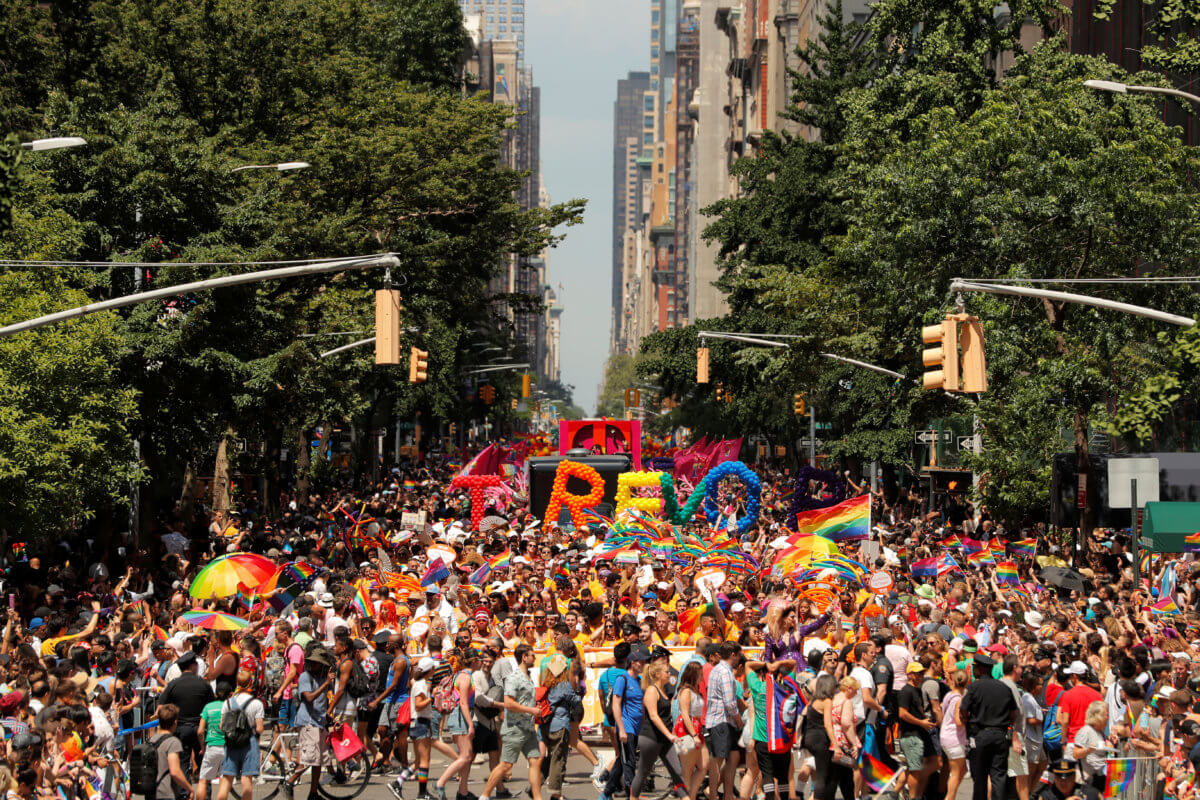 People march down 5th Avenue during the 2019 World Pride NYC and Stonewall 50th LGBTQ Pride Parade in New York