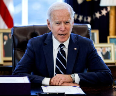 FILE PHOTO: U.S. President Biden signs the American Rescue Plan in Washington