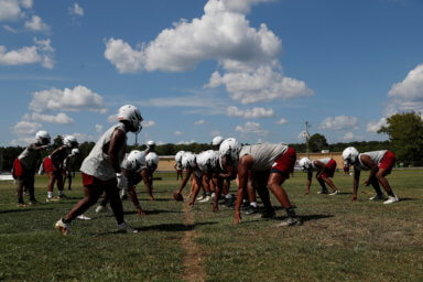 Fordyce Redbugs high school football players practice, at their home field in Fordyce, Arkansas