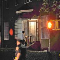 NYPD officers outside the crime scene in Bensonhurst on October 13, 2021.