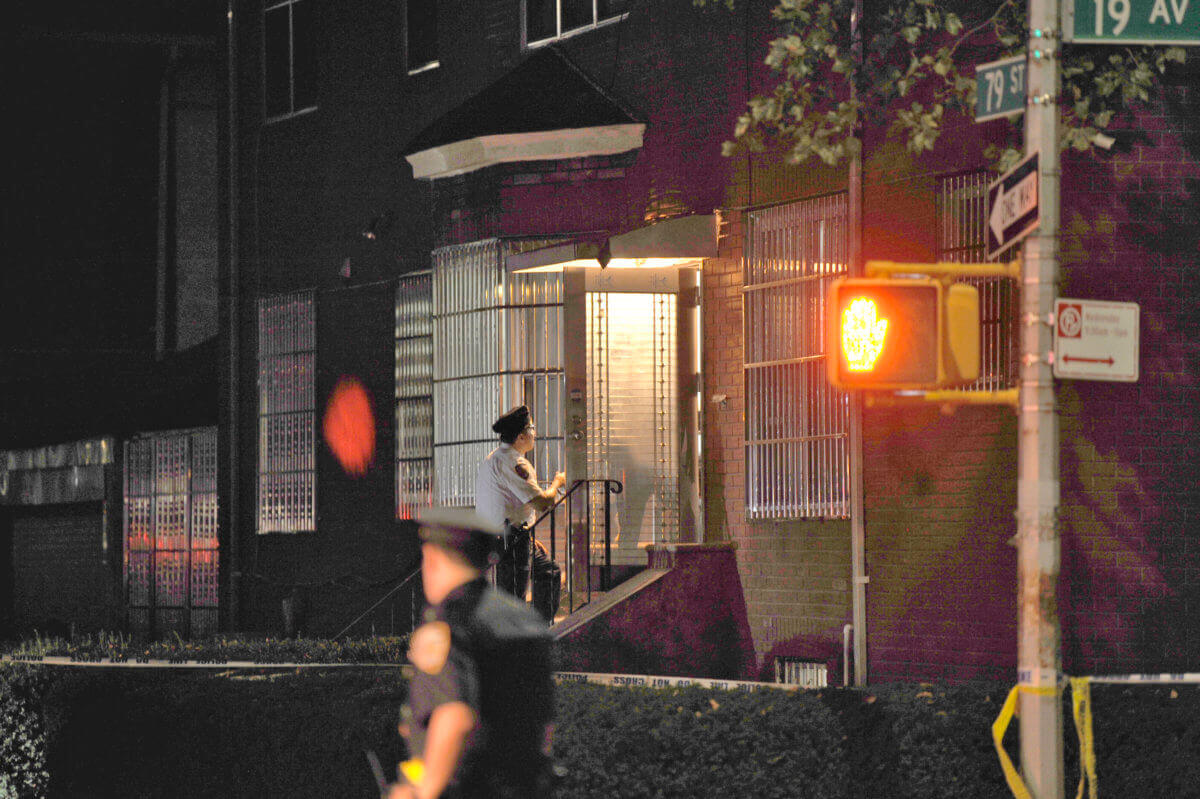 NYPD officers outside the crime scene in Bensonhurst on October 13, 2021.