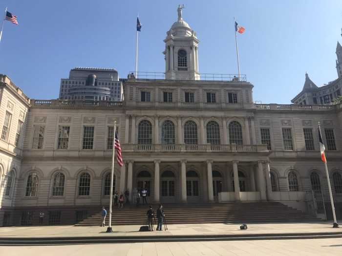 A view of the front steps of New York City Hall.