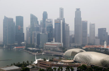 The financial district is seen shrouded by haze in Singapore