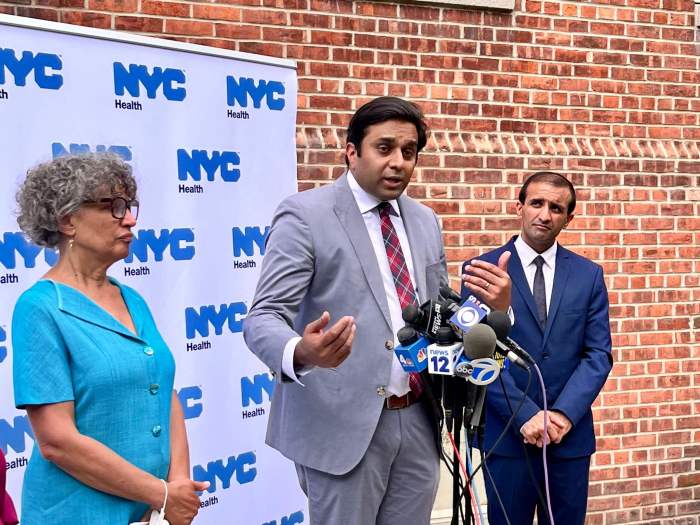 City Health Commissioner Ashwin Vasan speaks alongside then-New York State Health Commissioner Mary T. Bassett (left) and Raj Panjabi, then the coordinator of the White House Pandemic Office (right), at an mpox press conference outside of the city's Harlem clinic on July 7, 2022.