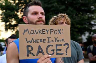 Activists show frustration over the government's response to mpox on July 22, 2022.