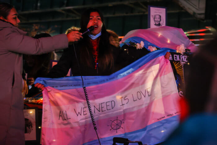 "ALL WE NEED IS LOVE" is written on the Transgender Flag.