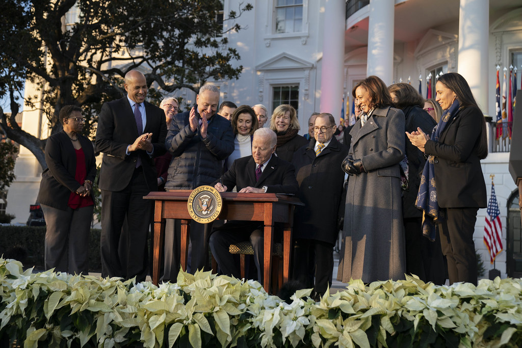 President Joe Biden signs the Respect for Marriage Act on Tuesday, December 13, 2022, on the South Lawn of the White House.