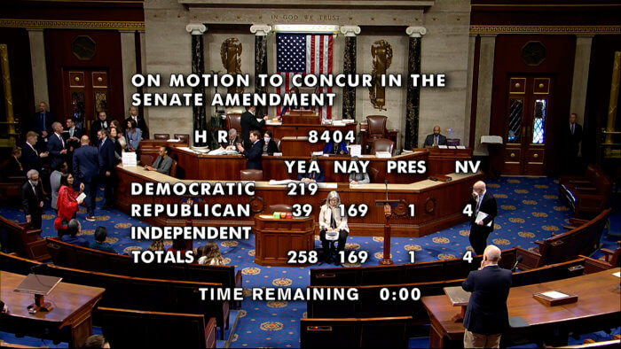 In this image from House Television, the vote total for the Respect for Marriage Act is seen on the House Floor, Thursday, Dec. 8, 2022, in Washington.