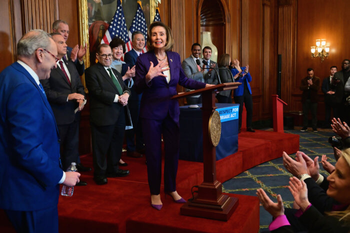 House Speaker Nancy Pelosi at the podium