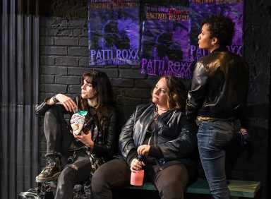 Three people in a scene from "Rock the Line."