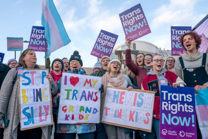 Supporters of the Gender Recognition Reform Bill (Scotland) take part in a protest outside the Scottish Parliament in Edinburgh on Tuesday, Dec. 20, 2022.