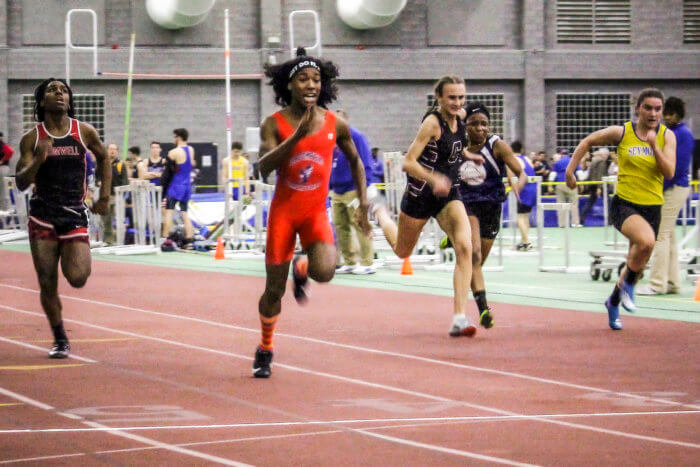 Bloomfield High School athlete Terry Miller, second from left, wins the final of the 55-meter dash over athlete Andraya Yearwood, far left, and other runners in the Connecticut girls Class S indoor track meet at Hillhouse High School in New Haven, Conn., Feb. 7, 2019.