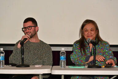 Jason Rosenberg of ACT UP and Ivy Arce of Treatment Action Group during one of the panel discussions.