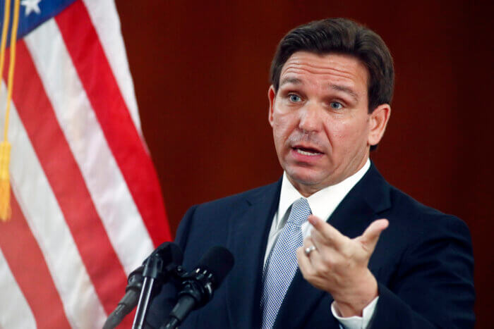 Florida Governor Ron DeSantis answers questions from the media in the Florida Cabinet following his State of the State address during a joint session of the Senate and House of Representatives, Tuesday, March 7, 2023, at the state Capitol in Tallahassee, Florida.