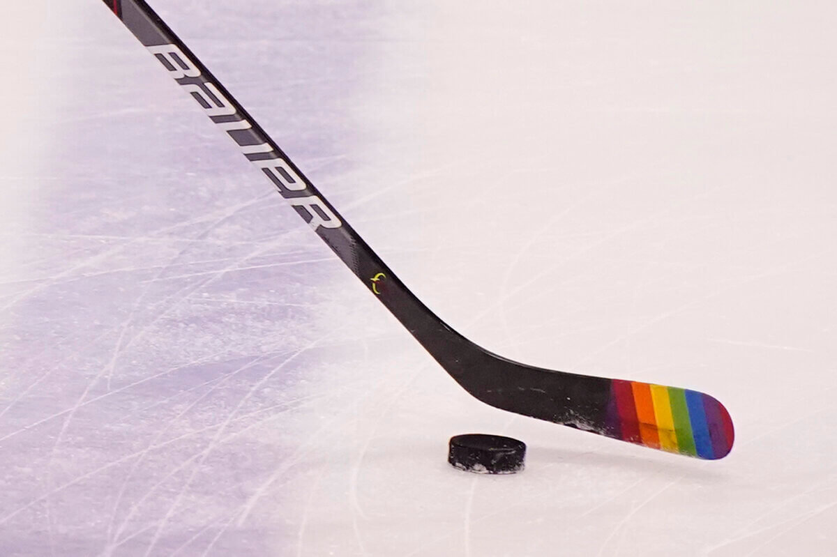 The Chicago Blackhawks will not wear Pride-themed warmup jerseys before Sunday's Pride Night game against Vancouver because of security concerns involving a Russian law that expands restrictions on activities seen as promoting LGBTQ rights in the country.