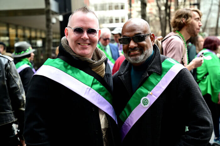 St. Pat’s for All board member Archley Prudent and his hubby Hugh Gallagher.