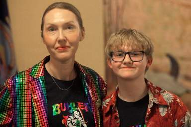 Cat Poland, of Buhler, Kansas, poses with her 13-year-old trans son, Alex, after a day of lobbying by LGBTQ youth and their advocates at the Statehouse, Tuesday, March 28, 2023, in Topeka, Kan. Alex runs cross country and hopes to play baseball next year.