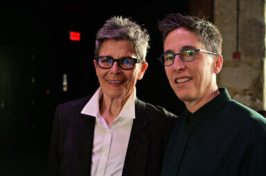 Alison Bechdel and Kate Clinton during a marathon reading of the late Urvashi Vaid's book, “Virtual Equality."