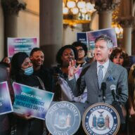 Manhattan State Senator Brad Hoylman-Sigal and LGBTQ advocates in Albany earlier this year.