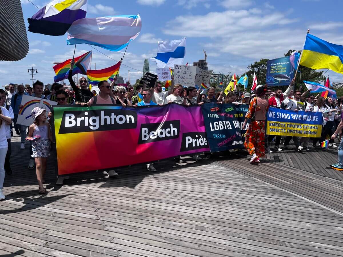 The Brighton Beach Pride March proceeds from Coney Island to the east along the Riegelmann Boardwalk on May 21.