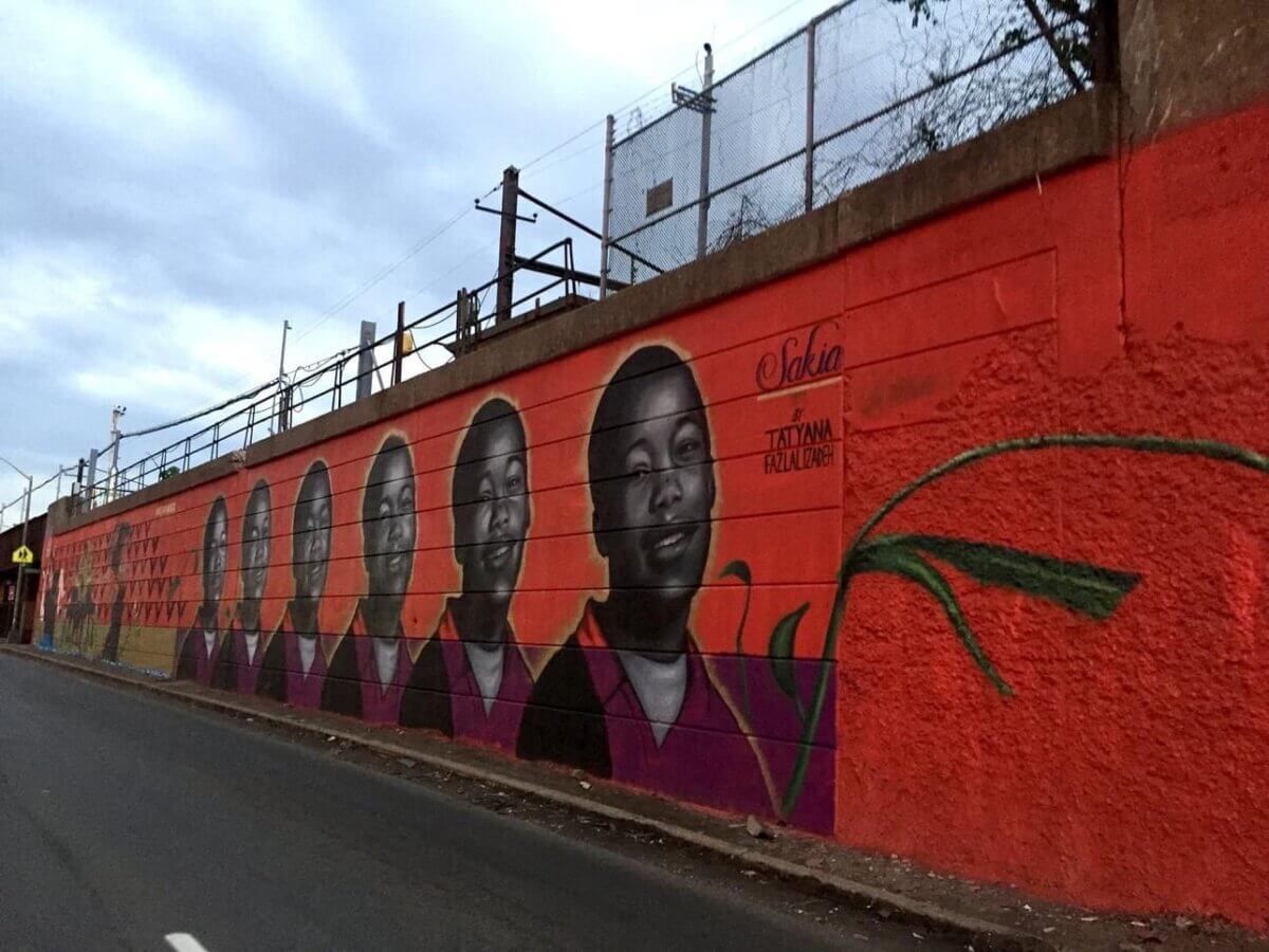 The "Sakia, Sakia, Sakia, Sakia" mural along the McCarter Highway painted by Tatyana Fazlalizadeh in memory of Sakia Gunn in 2016 as a part of the Newark Downtown District’s Gateways to Newark initiative, “Portraits.”