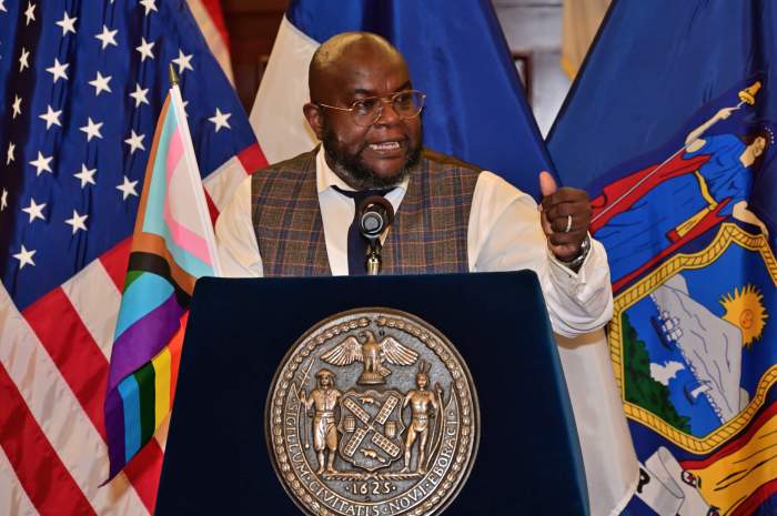 Destination Tomorrow's Sean Coleman delivers remarks at the City Council's Pride event in 2023.