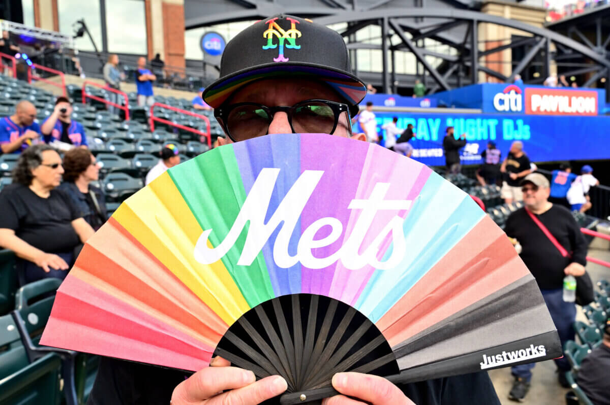 Fans received a Mets Pride fan at Citi Field on June 16.