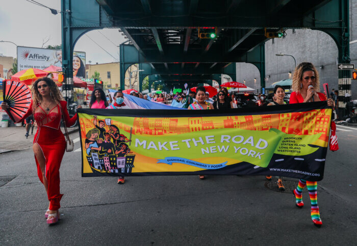 Make the Road NY's colorful banner leads the way.