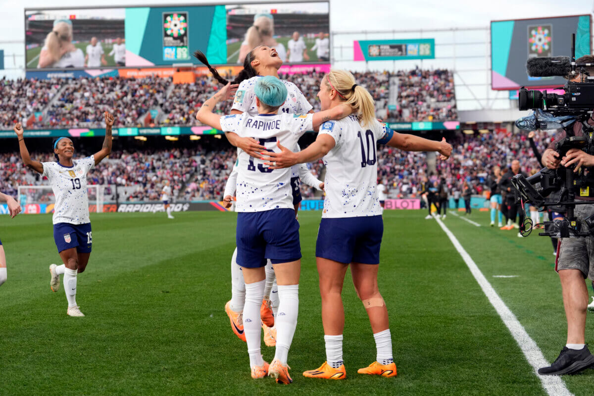 United States' Lindsey Horan (10), Megan Rapinoe (15) and Sophia Smith top, celebrate after Horan scored their third goal during the second half of the Women's World Cup Group E soccer match between the United States and Vietnam at Eden Park in Auckland, New Zealand, Saturday, July 22, 2023.