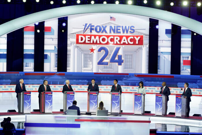 Republican presidential candidates stand at their podiums during a Republican presidential primary debate hosted by FOX News Channel Wednesday, Aug. 23, 2023, in Milwaukee. 
