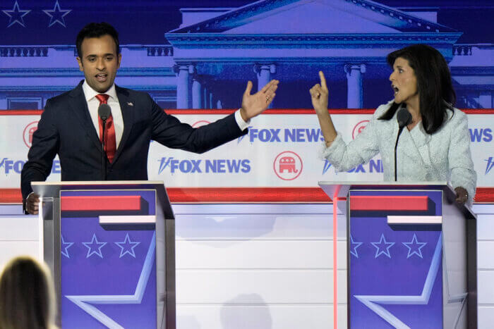 Vivek Ramaswamy and Nikki Haley speak during a Republican presidential primary debate hosted by FOX News Channel Wednesday, Aug. 23, 2023, in Milwaukee. 