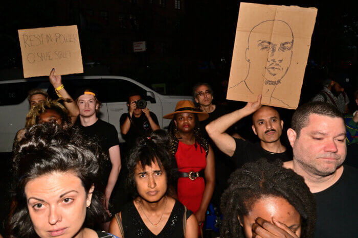 Community members gather to remember O'Shae Sibley outside of the Stonewall Inn on Aug. 3.