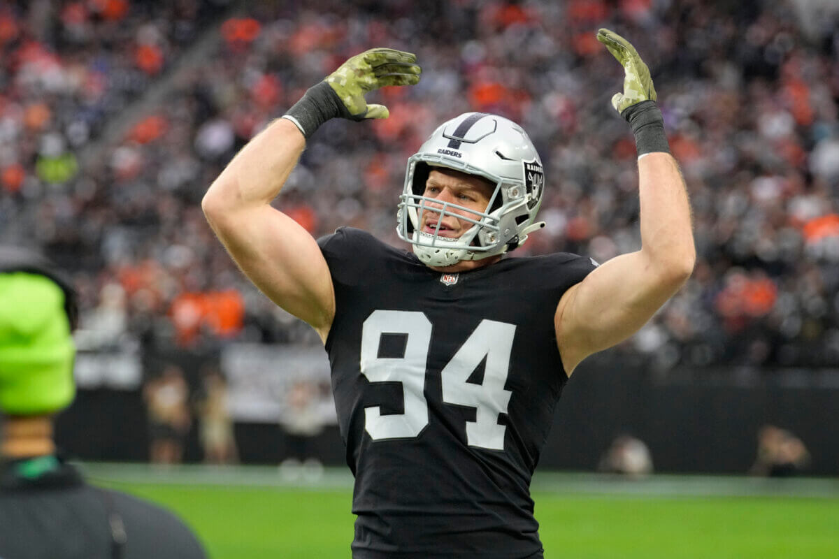 Former Las Vegas Raiders defensive end Carl Nassib (94) on the sideline during the first half of a game against the Denver Broncos on Sunday, Dec. 26, 2021, in Las Vegas.