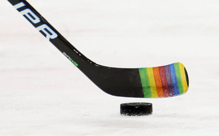 Zac Jones of the New York Rangers skates with a stick decorated for "Pride Night" in warm-ups prior to the game against the Washington Capitals, May 3, 2021, in New York City.