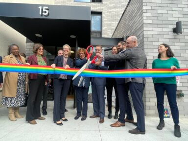 Homeward CEO Jeannette Ruffin, flanked by Manhattan Borough President Mark Levine and others, cuts the ribbon to mark the opening of Homeward Central Harlem on Tuesday, Oct. 24.
