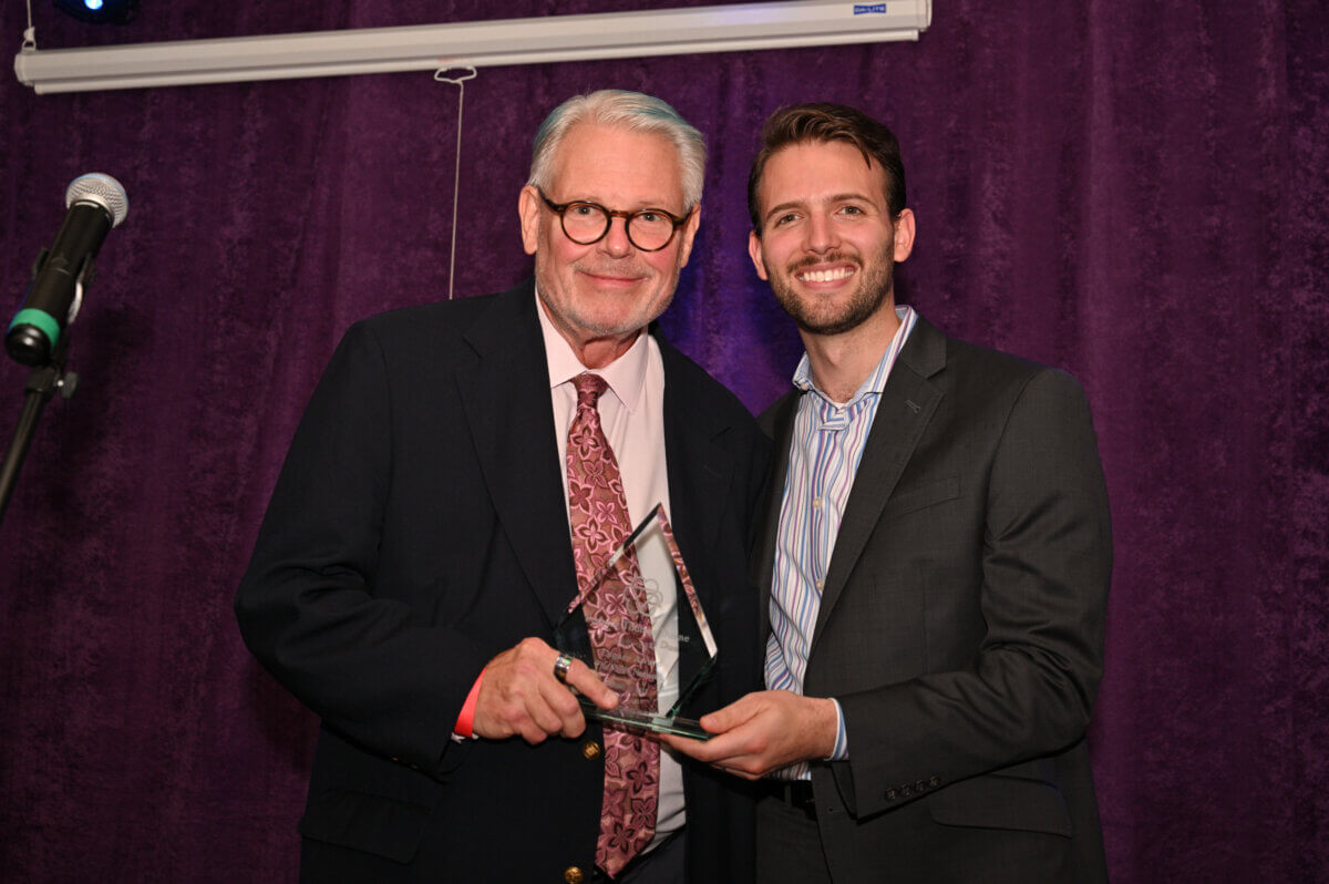 Former State Senator Tom Duane receives the Legacy Award from The Pride Network's Jacob Rudolph.