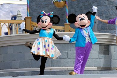 Minnie and Mickey Mouse perform for guests during a musical show in the Magic Kingdom at Walt Disney World Friday, July 14, 2023, in Lake Buena Vista, Fla.