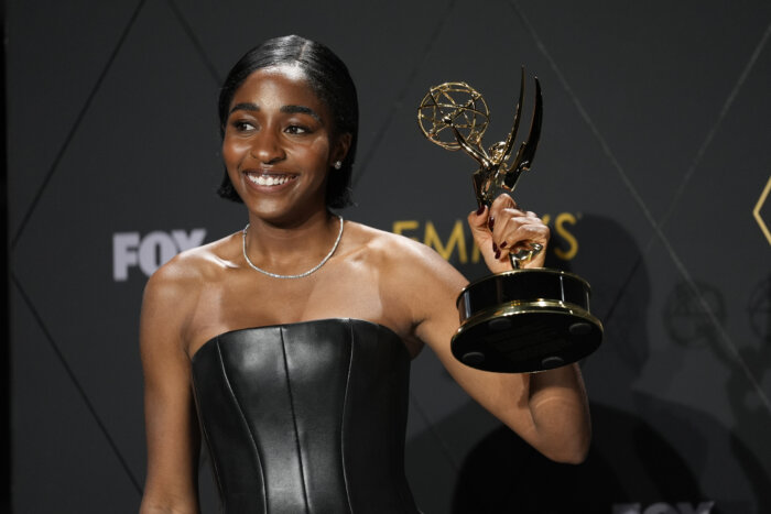 Ayo Edebiri, winner of the award for outstanding supporting actress in a comedy series for "The Bear," poses in the press room during the 75th Primetime Emmy Awards on Monday, Jan. 15, 2024, at the Peacock Theater in Los Angeles. 