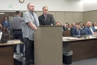 In this image taken from video provided by the Colorado Judicial Branch, Anderson Lee Aldrich, left, the suspect in a mass shooting that killed five people at a Colorado Springs LGBTQ+ nightclub in 2022, appears in court, June 26, 2023, in Colorado Springs, Colo., where they pleaded guilty in the attack. Aldrich was charged with federal hate crimes on Tuesday, Jan. 16, 2024.