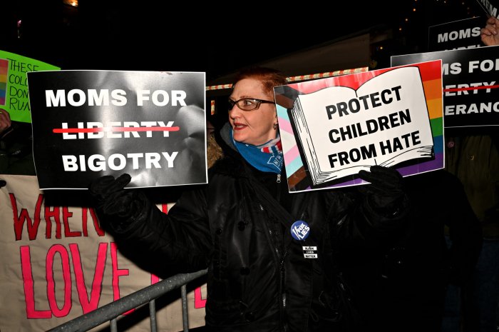Community activist Julie DeLaurier protests a Moms for Liberty event on Jan. 18 in Manhattan.