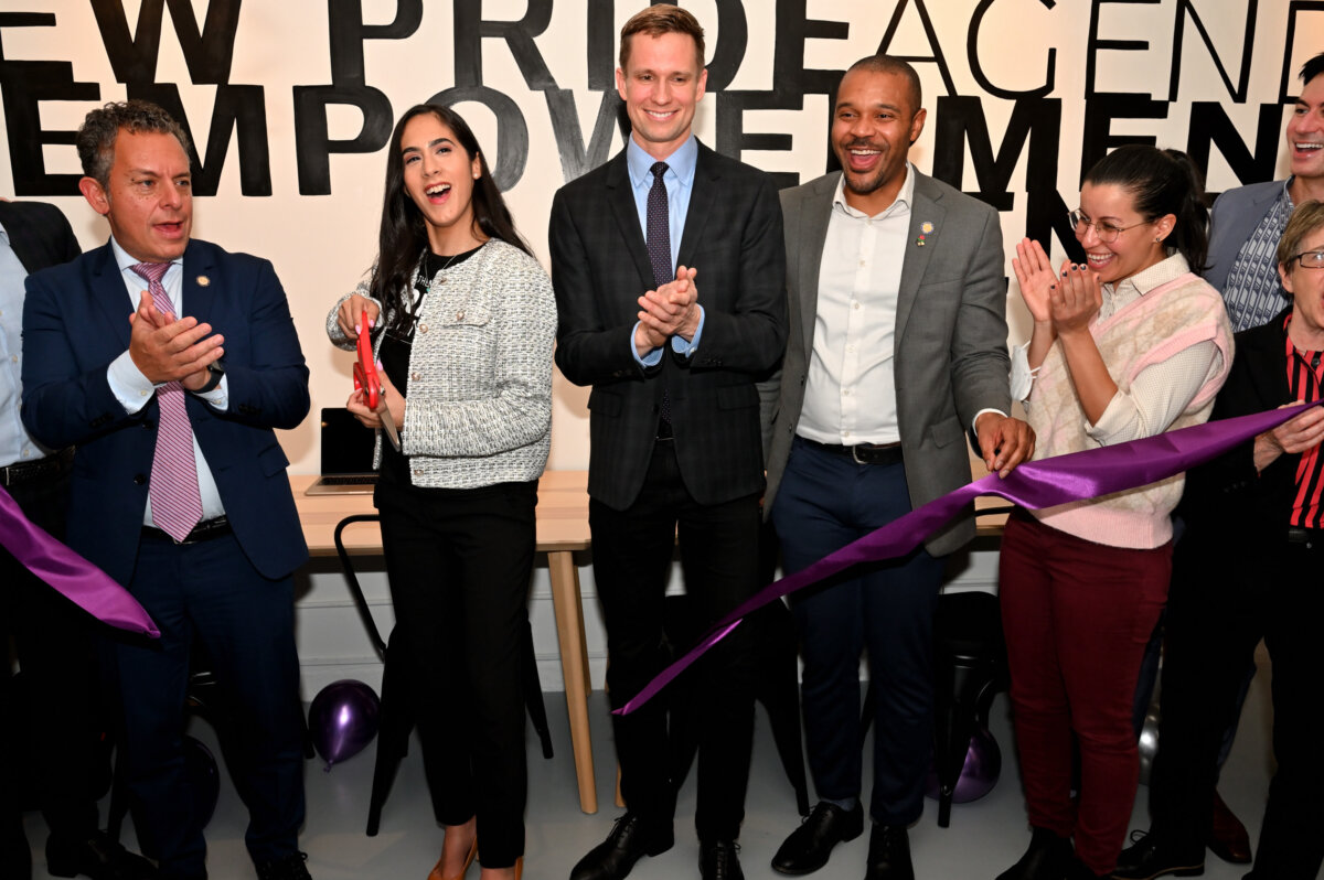 New Pride Agenda executive director Elisa Crespo cuts the ribbon to signal the official opening of the new space at West 29th St.