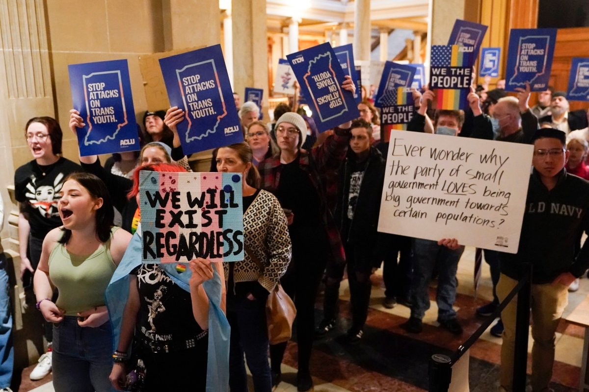Protesters stand outside of the Senate chamber at the Indiana Statehouse, Feb. 22, 2023, in Indianapolis. On Tuesday, Feb. 27, 2024, a federal appeals court in Chicago stayed an injunction from an Indiana district court that blocked most of the state's ban on gender-affirming care for minors, allowing the ban to take effect.