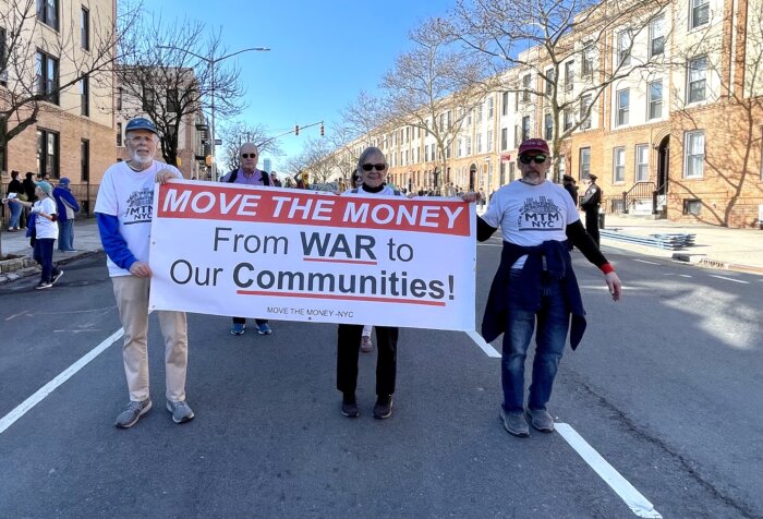 Move the Money, which advocates to replace military spending with funding for housing, healthcare, education, and infrastructure, marches along.