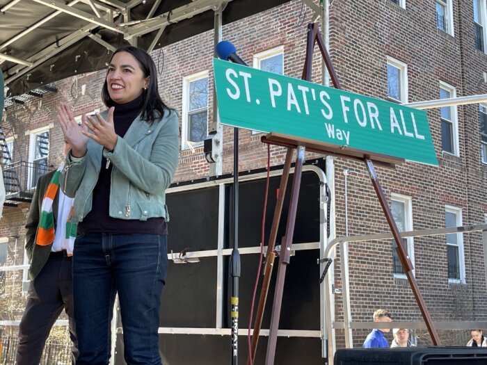 Congressmember Alexandria Ocasio-Cortez cheers on alongside the St. Pat's for All Way following a street renaming ceremony.